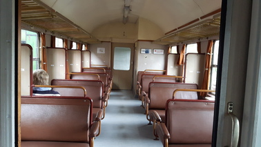 Benches inside a railroad carriage